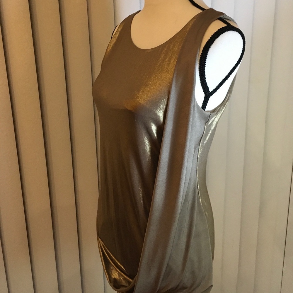 Shinny gold dressy sleeveless top, very soft to the touch